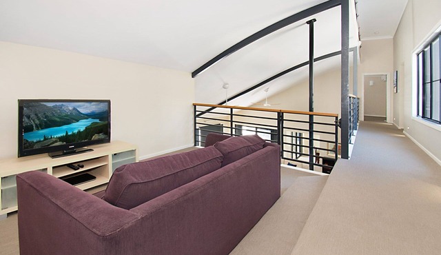 This large and airy tri-level home offers the pinnacle of beachside living