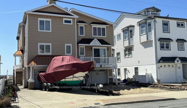 This lovely 3 bedroom 2 and a half bath home is located directly on the bay in Sea Isle City