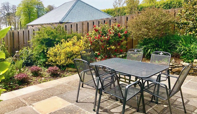 This lovely property sits on the edge of a private estate with a south-facing patio.