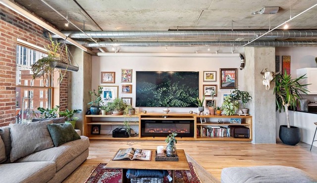 this modern and sophisticated loft has spectacular city views
