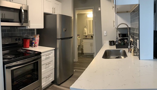 This quiet property is a comfy gem to the busy city.