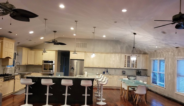 This Ranch style home is equipped with a beautiful pool, patio, BBQ and more