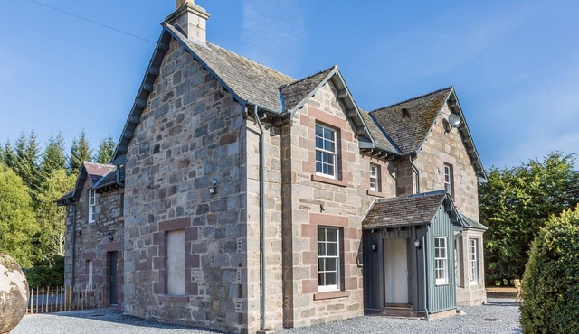 This recently renovated farmhouse features two spacious bedroomed apartments that can be joined to g