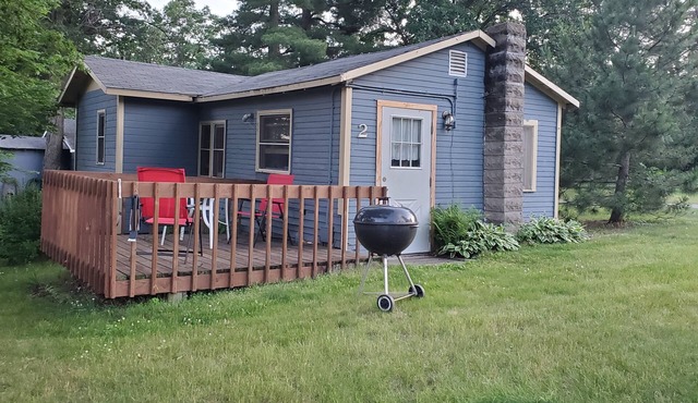 This rustic and charming cabin has great views of Hardy Lake.