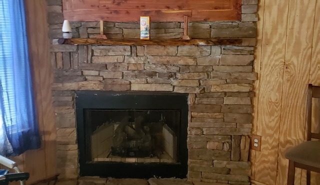 This secluded cabin is tucked away in the mountains. With a handicap access ramp