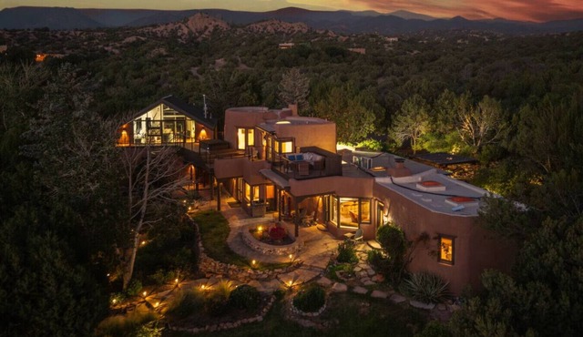 This serene, green oasis tucked into the hills of Tesuque off a private road combines rustic luxury and tranquility. Private wet and dry saunas along with hot tub with phenomenal views!