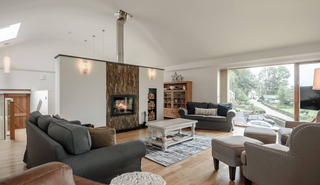 This striking home is ideally located between the beach and the hills.