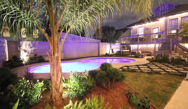 THIS STUNNING AND SPACIOUS UPTOWN OASIS HAS A POOL AND HOT TUB!