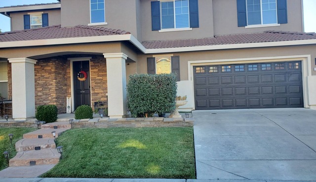 This stunning luxury home is located 10 minutes from the airport and downtown!