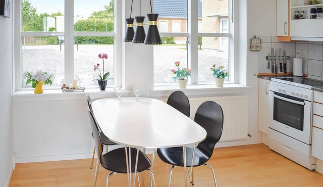 This terraced house is located only 50 m from the harbor in Lohals.