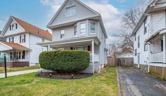 This vintage home in Akron provides easy access to nearby cities & attractions.