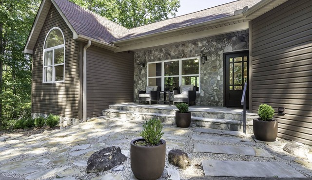 This wooded retreat has everything! Spring & Summer right around the corner!