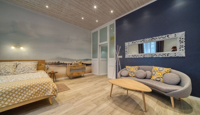 three apartments on the ground floor of a private mansion dating from 1430