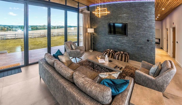 Three bed lodge with two king-size beds and one twin (king by arrangement).