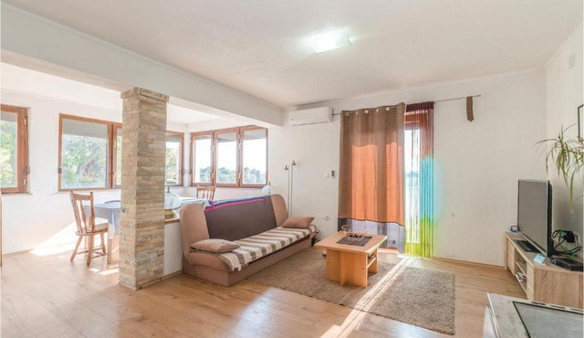 Three-Bedroom Apartment in Biograd