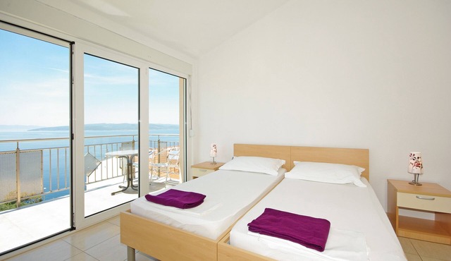 Three bedroom apartment with balcony and sea view Krvavica, Makarska (A-18911-b)