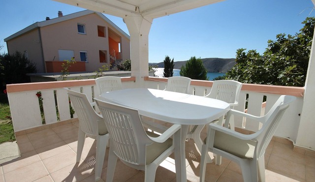Three bedroom apartment with terrace and sea view Vlašići, Pag (A-4319-c)