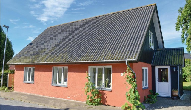 Three-Bedroom Holiday Home in Asaa