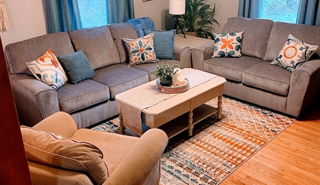 Three bedroom home in beautiful treelined neighborhood.