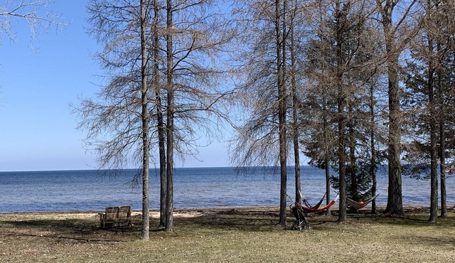 Three Bedroom House on 10 acres with 350 ft. Sand Beach on Lake Michigan.