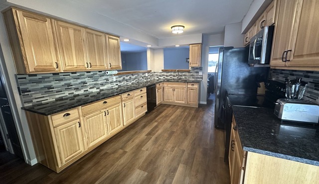 Three bedroom ranch style pet friendly home with a patio & theatre room!