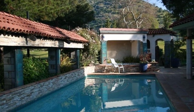 Three bedroom/three bath resort style home with saltwater pool and spa