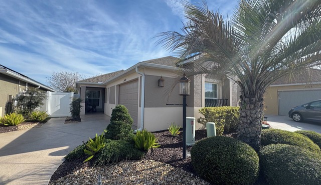 Three Bedrooms! Enclosed, private lanai. Close to 3 golf courses and Town Square