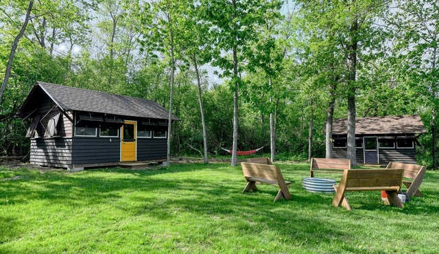 Three Cozy Historic Scout Cabins with Fire Pit, BBQ, and Hammocks for a Memorable Family Adventure in Troy, Wisconsin