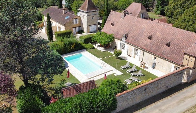 Three lovely stone houses, with private heated swimming pool and a huge garden,