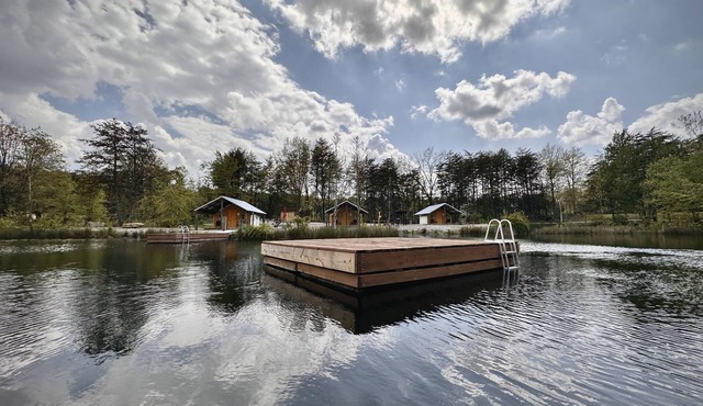 Three Lakeside Canvas Cottages group campsite at Parakeet Cove