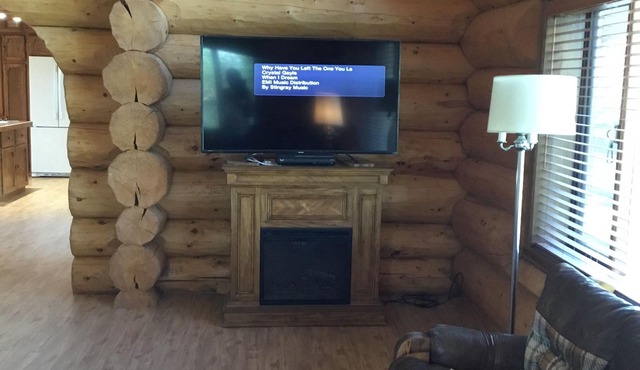 Three level Log Home on Private 40 Acre Estate.