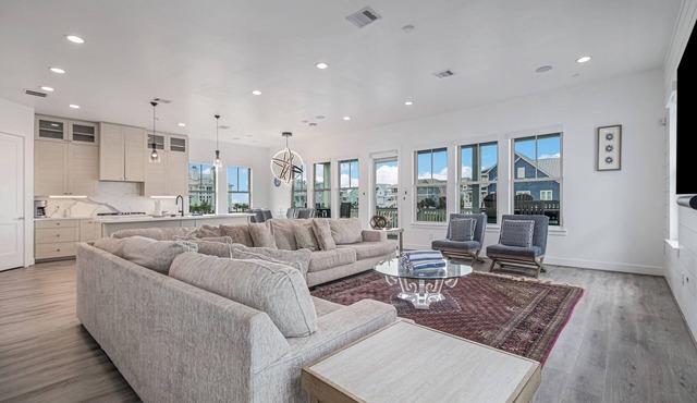 Three-story, beach home with decks & partial Gulf view