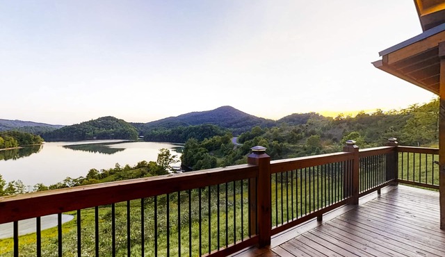 Three-story lake-view cabin with private hot tub, pool table, & AC