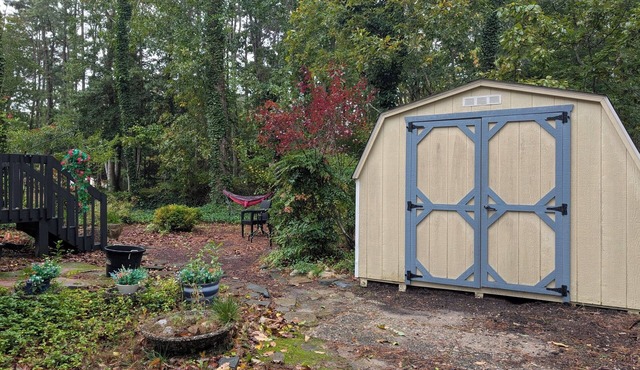 Tide & Timber by Avalon is a 4 bd home located in a peaceful, wooded cul-de-sac.