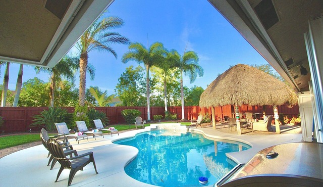 Tiki Place - 4 BR, Private Heated Saltwater POOL and Tiki Bar