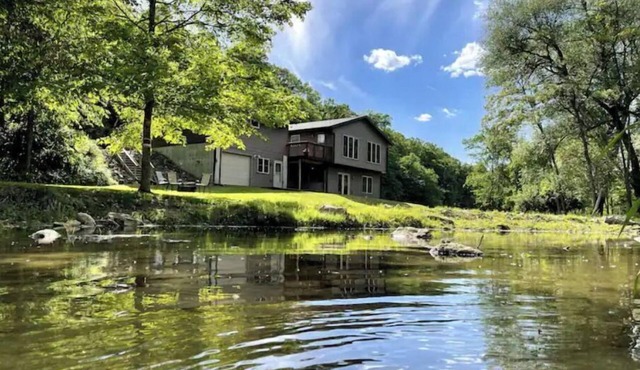 Timber Coulee Creek in backyard, king size bed, grill on deck, large garage.