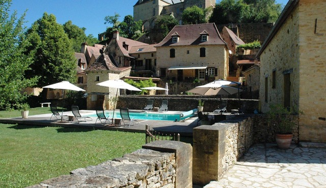 time for a break-The little house in the center of the village with a view of the castle