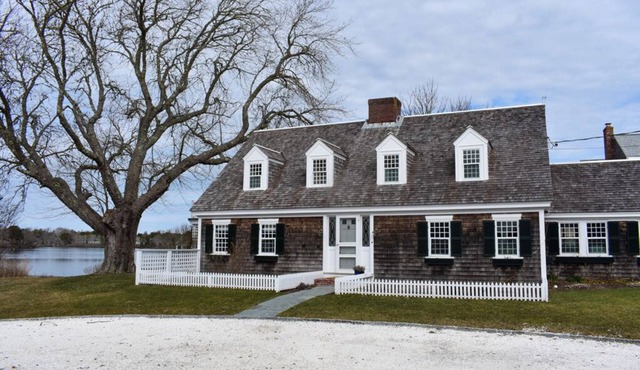 Timeless charm at this unique waterfront compound, sleeping 14.