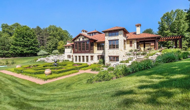 Timeless Euro Tuscan gated estate on 14.5 acres with vineyard, pond and gardens.