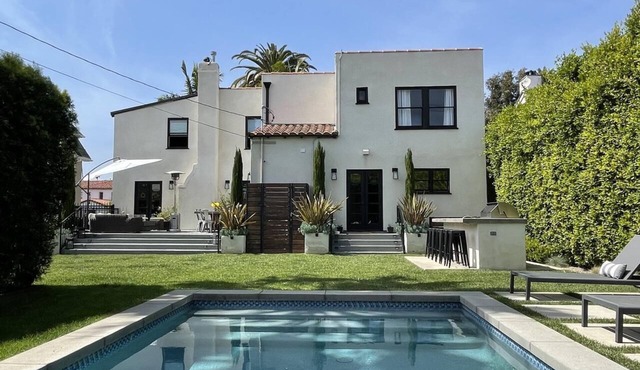 Timeless Spanish Estate Renovated with Outdoor Living Spaces, Pool & Large Yard