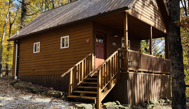 Tiny cabin in a little woodland village with pond access