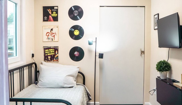 Tiny clean & simple hotel style room