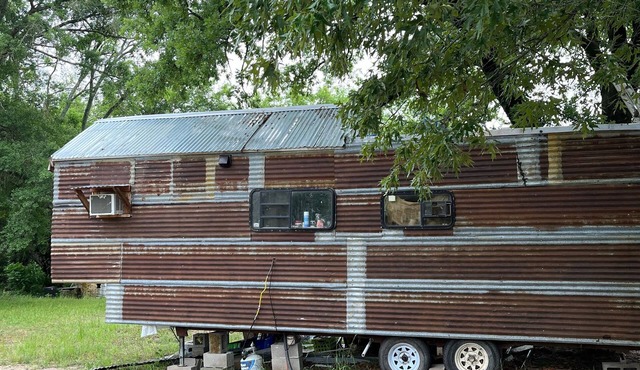 Tiny house on 14 acres with spring fed creek
