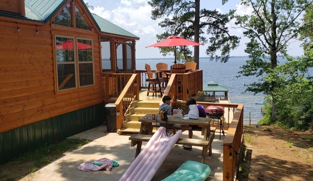 Tiny Toledo - Lakefront Cabin with Boathouse, Fishing Pier, and DRAMATIC Sunsets