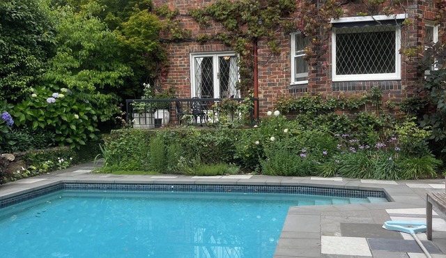 Toorak Tudor Family Home with modern kitchen and 1930's charm.