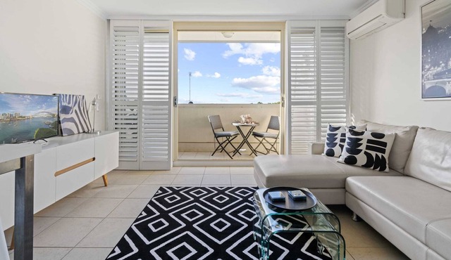 Top Floor Apartment with Balcony in Great Location