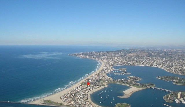 Top Floor Corner Unit Steps to Ocean or Bay !