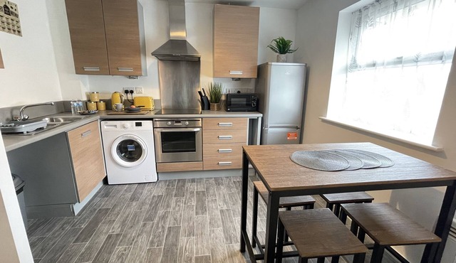 Top Floor Deluxe Apartment - With Balcony