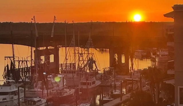 Top Floor luxury 3-bedroom condo w/river and marsh views - Walk to dining.