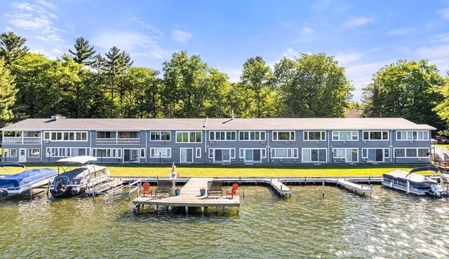 Torch Lake, a Short Boat Ride Away from this Clam Lake Efficiency Condo